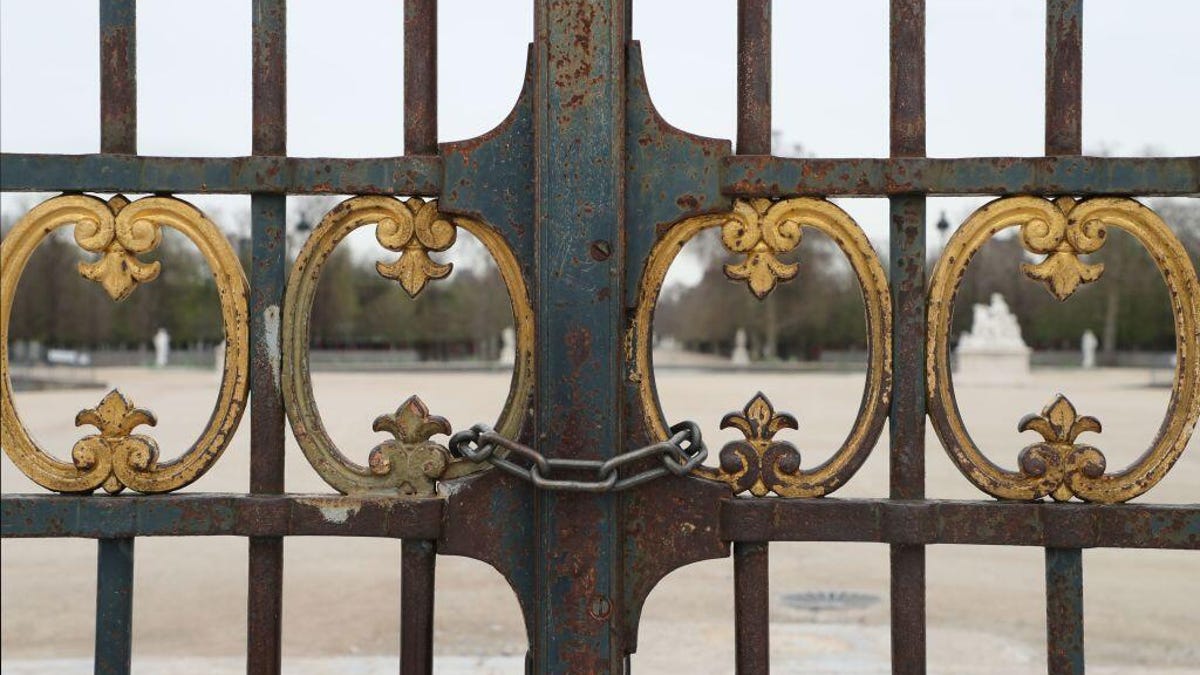 The gates of the closed Tuileries Gardens in Paris, on March 16, 2020, as all nonessential public places have been closed to prevent the spread of COVID-19.