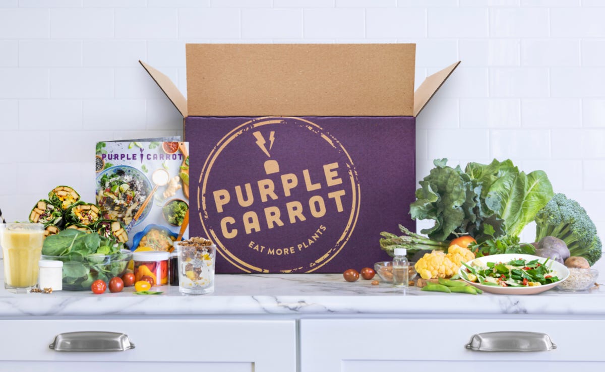 purple carrot meal kit on table next to box