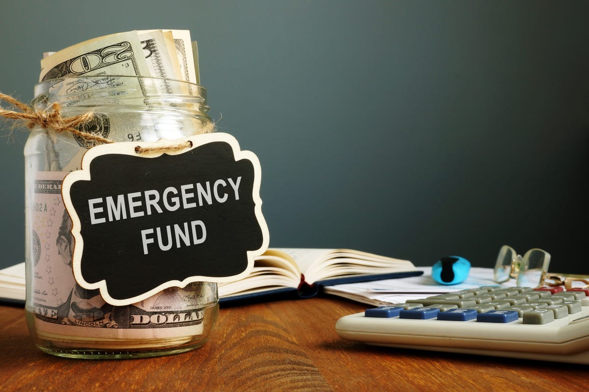 Emergency fund jar with money in it
