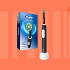 The Oral-B Pro 1000 electric toothbrush is displayed against an orange background.