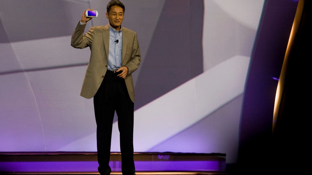 Hirai holding one of the company's PSP units at E3 2010.