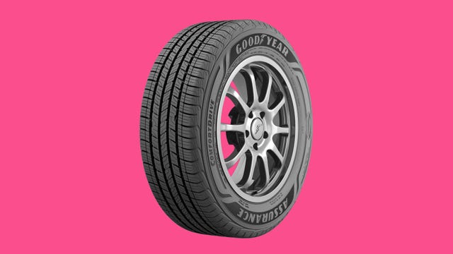 The Goodyear Assurance ComfortDrive tire pictured on a pink background