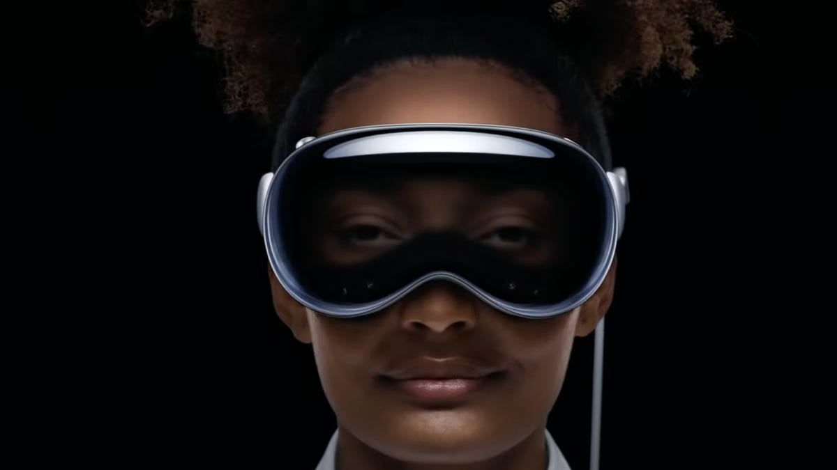 Woman wearing Apple headset