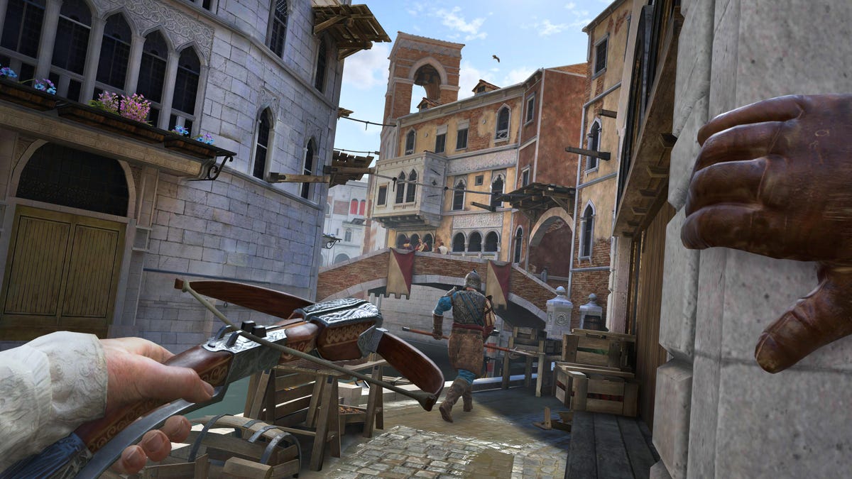 A hand holding a crossbow in a Venice city street in a video game, Assassin's Creed