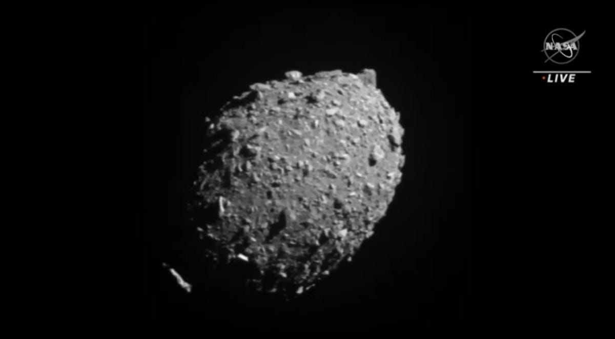 a gray, craggly asteroid against the dark of space