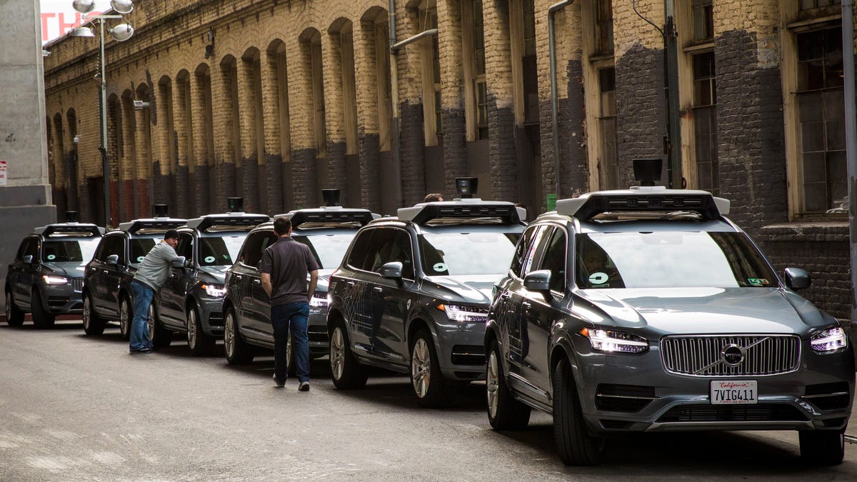 A fleet of self-driving Uber cars in San Francisco last December. The company has settled a lawsuit stemming from a rape in India in 2014.