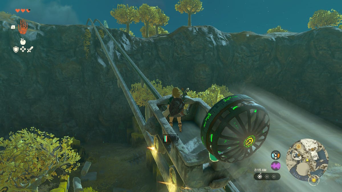 Link on a fan-equipped mine cart in the game Zelda Tears of the Kingdom