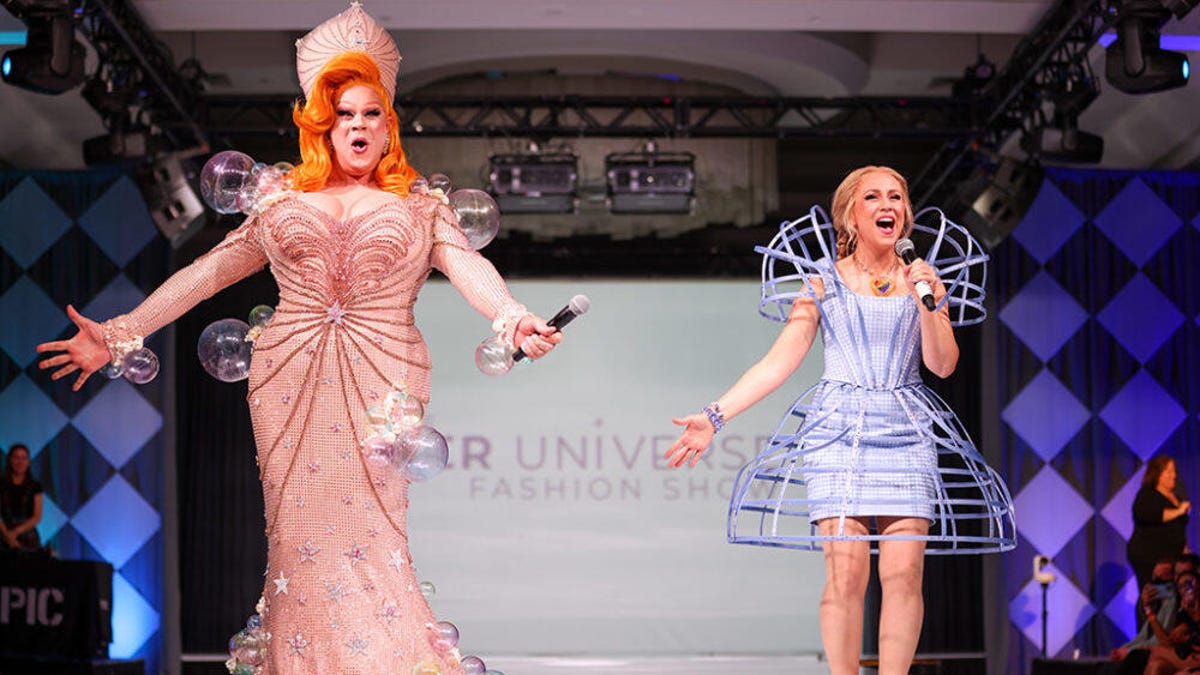 Nina West and Ashley Eckstein in costume on the Her Universe runway