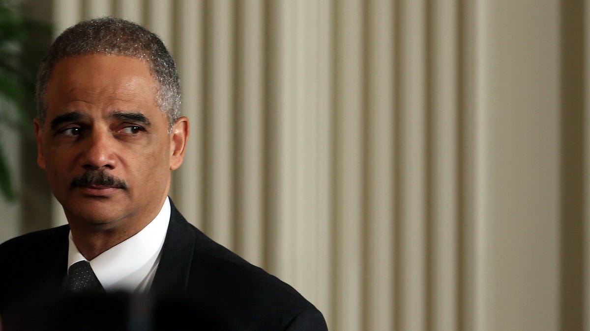Attorney General Eric Holder, shown here earlier today, has not permitted Google to disclose what information it is -- and isn't -- forced to turn over to the feds.