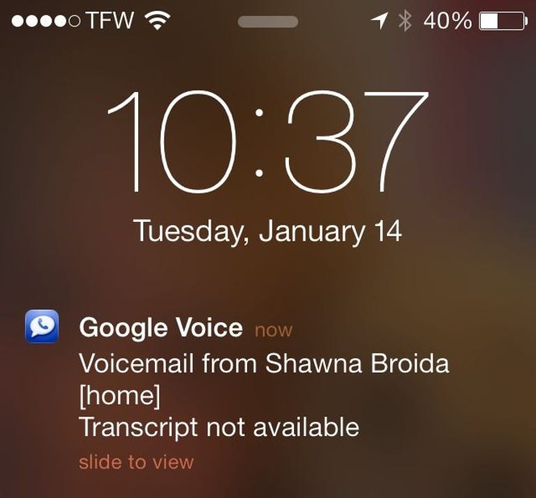 The Google Voice app will notify you of new voice mail messages.