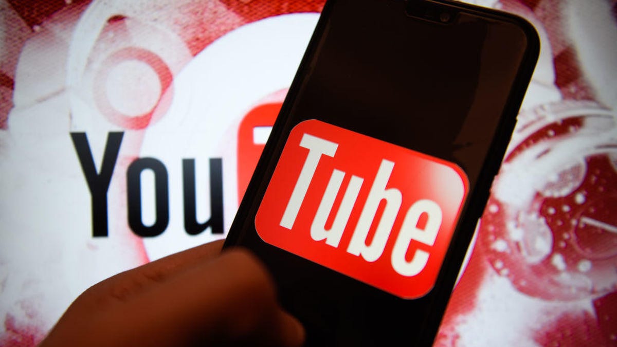 Youtube logo is seen on an android mobile phone