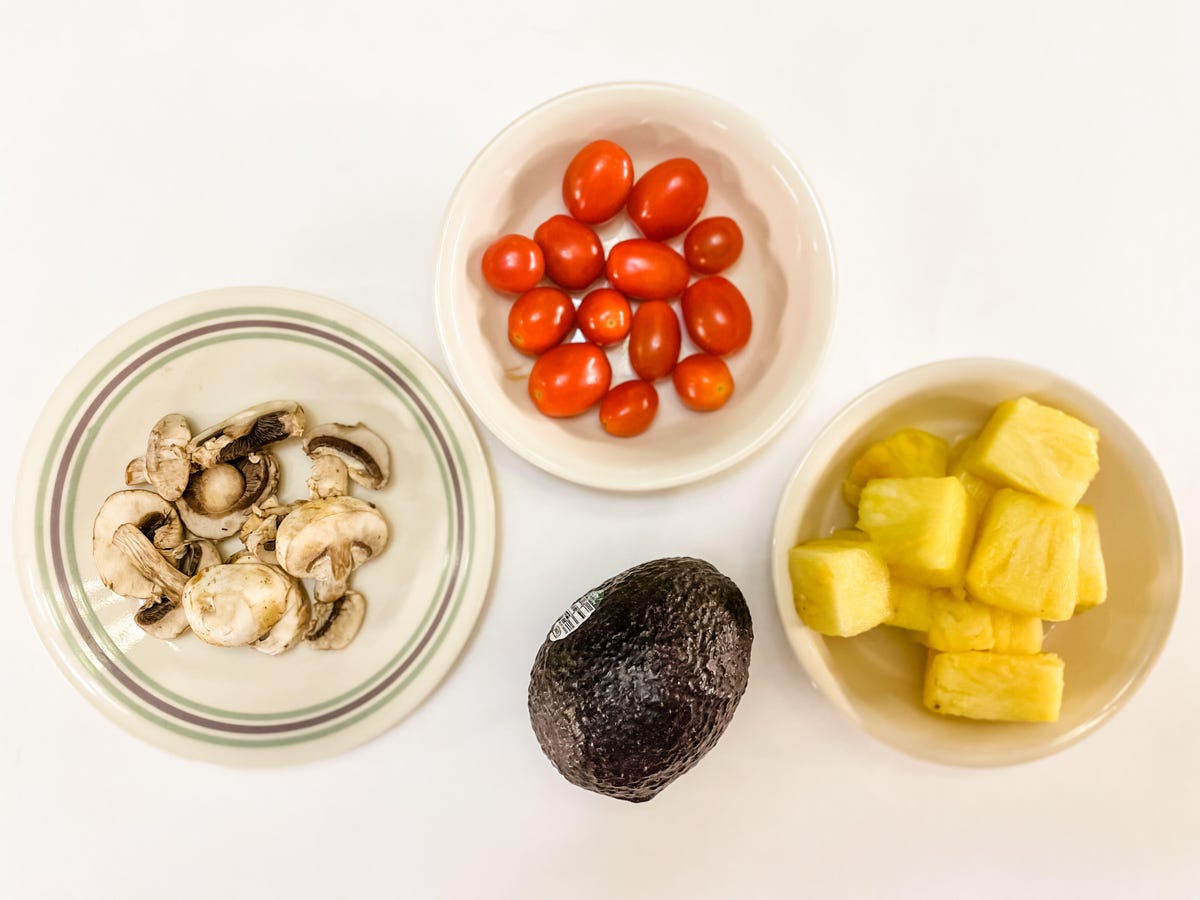 5 servings of produce: half cup mushrooms, half cup cherry tomatoes, one cup pineapple, one avocado