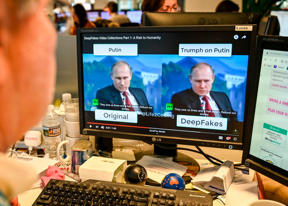 A computer screen shows an image of Vladimir Putin next to an doctored image of Putin.