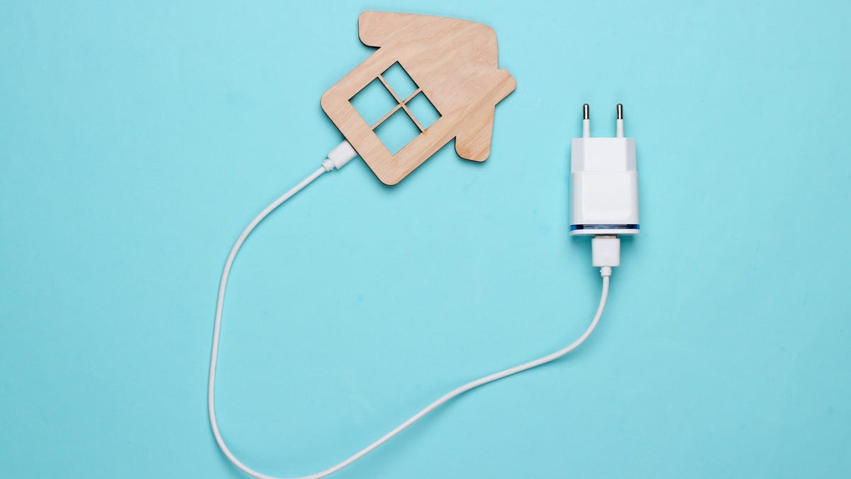 Graphic of charging cable connected to icon of a home