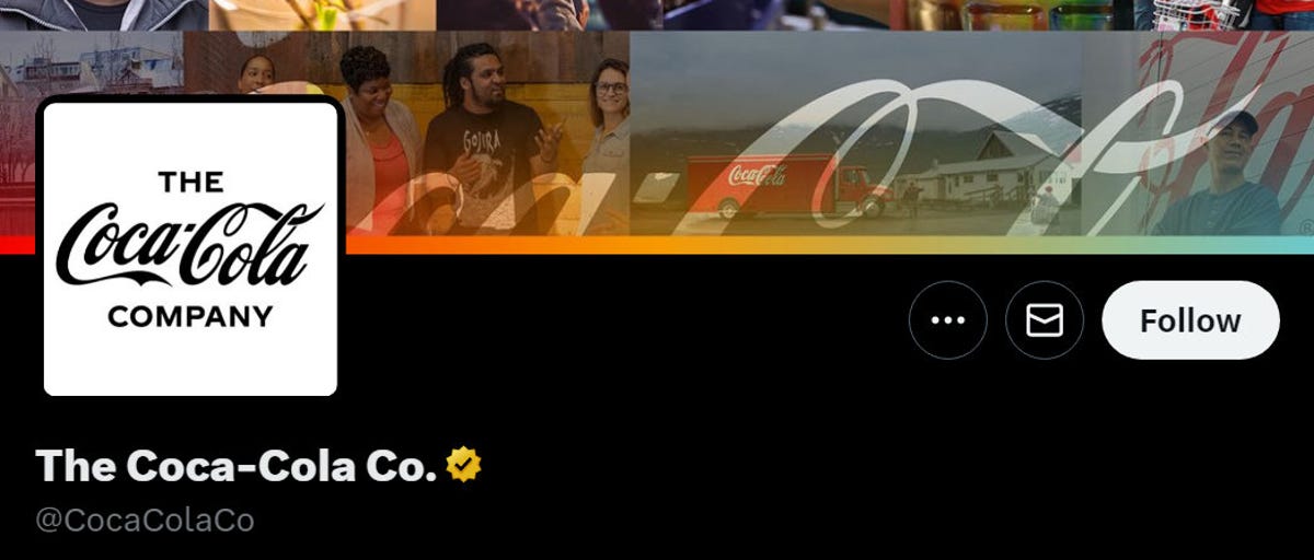 Coca-Cola Company's Twitter header with colorful photos of people with a square black and white script logo and a yellow/gold check mark beside the account name.