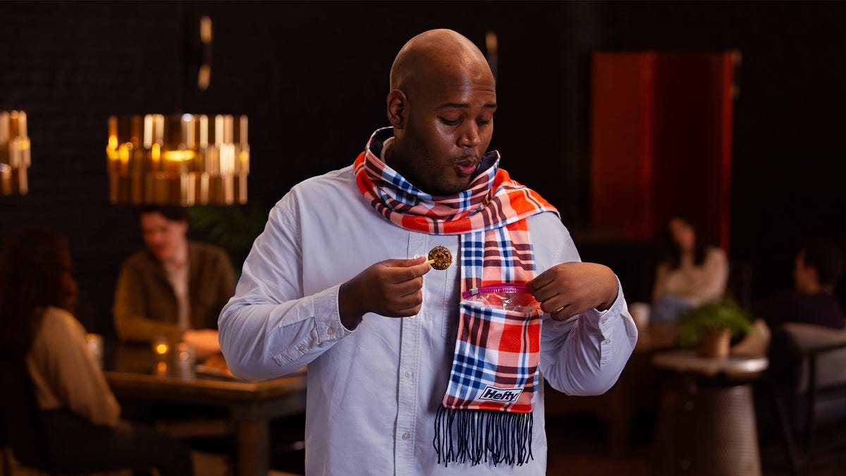 Man wearing a scarf around his neck