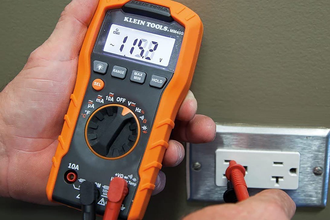 The Klein Tools MM400 multimeter taking a reading