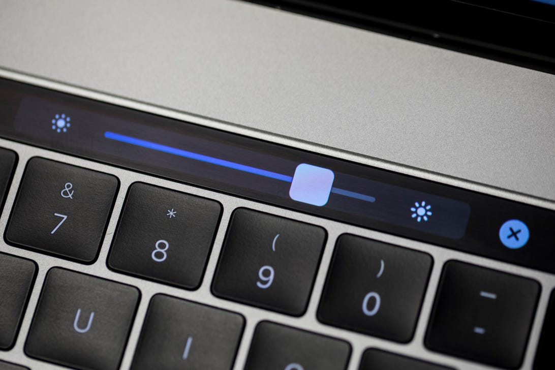 The 2016 MacBook Pro Touch Bar lets you dim the laptop's screen to save power.​