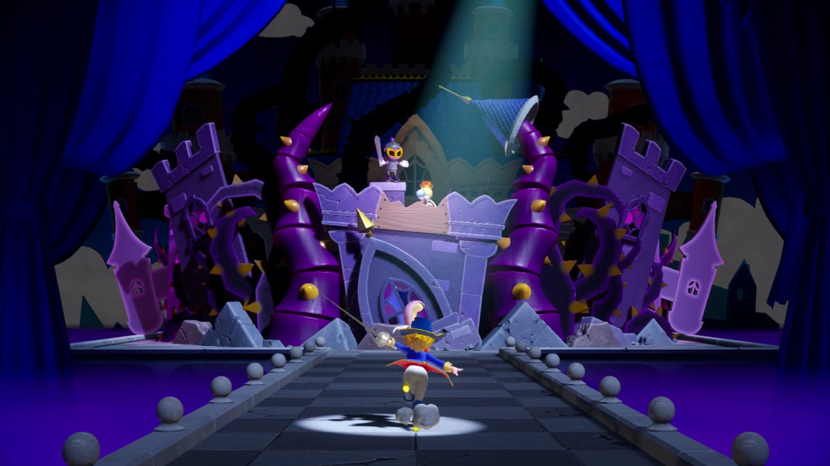Princess Peach approaching a fort on a stage set, in a level from a video game