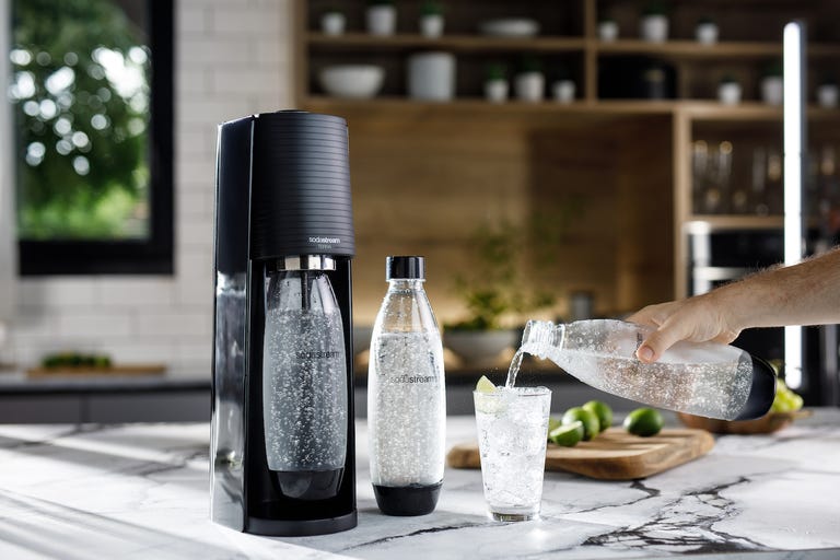 SodaStream Terra soda water maker with bottles and water glass