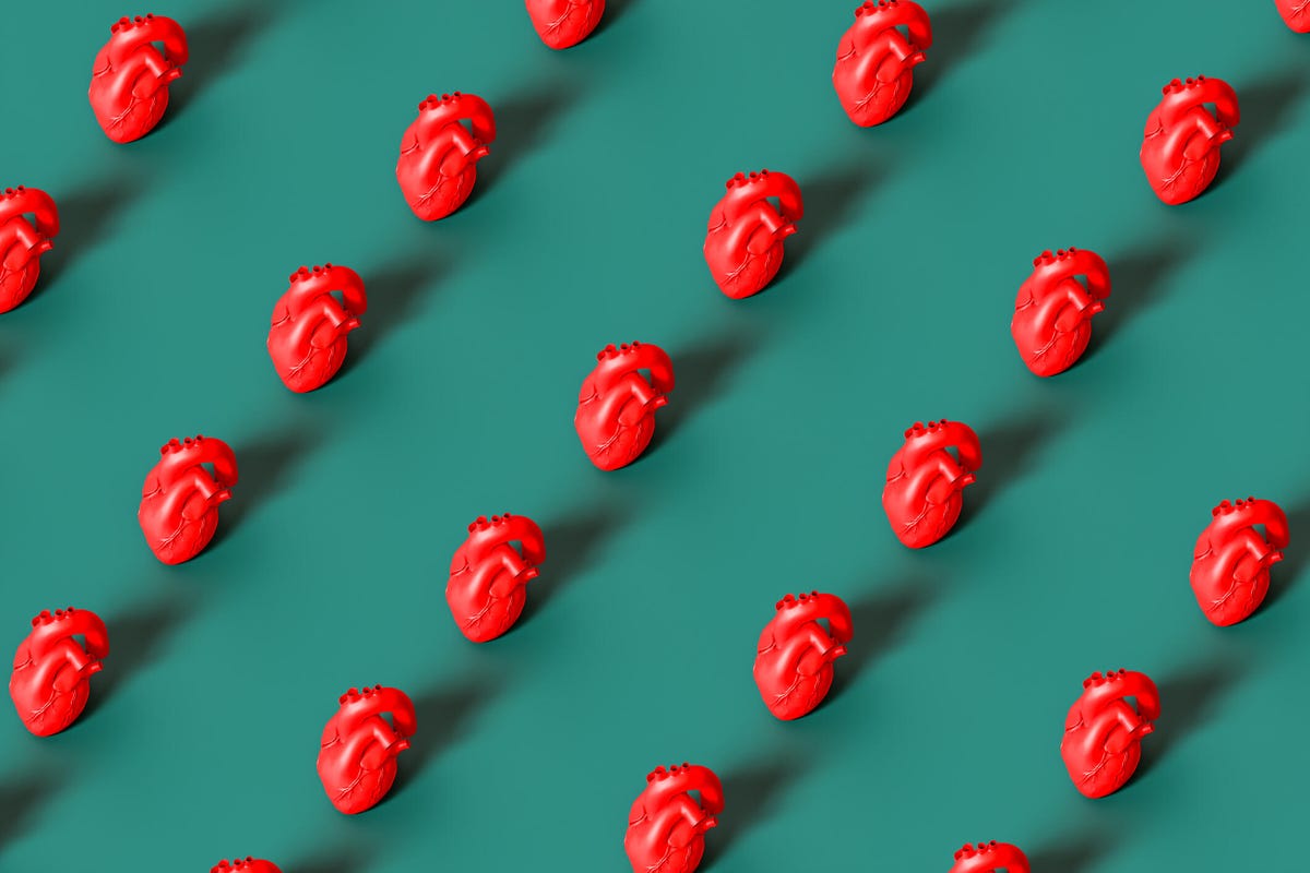 Several rows of hearts against a green background