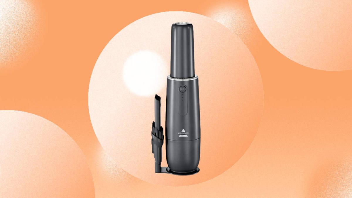The Bissell AeroSlim cordless handheld vacuum is displayed against an orange background.