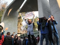 <p>People gather to protest in Tehran on Dec. 30.</p>