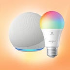 A white Echo Dot and a multicolor bulb on an orange background