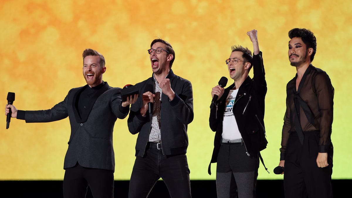The four members of The Try Guys on stage