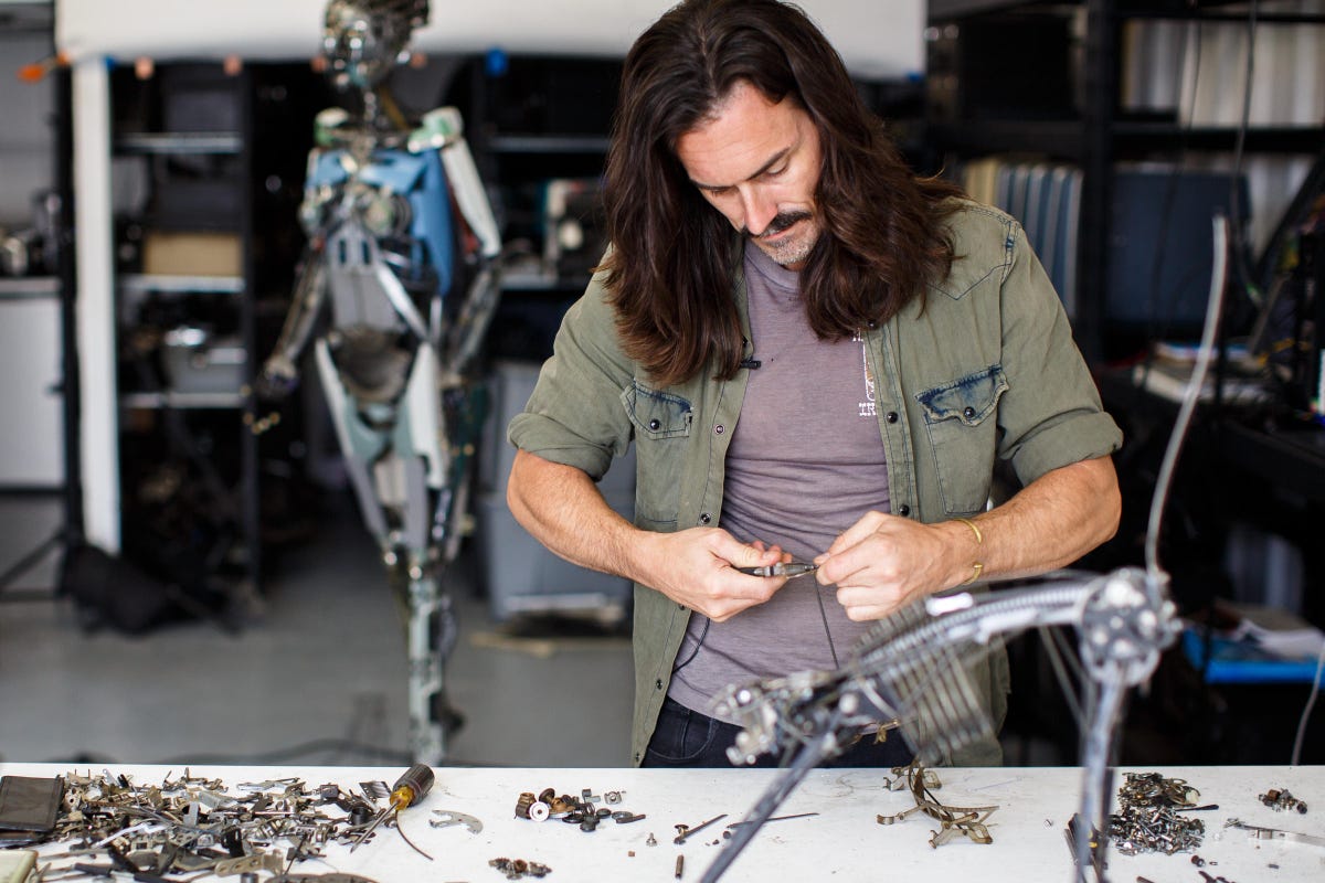 Artist Jeremy Mayer wrangles typewriter parts to create some anthropomorphic magic.