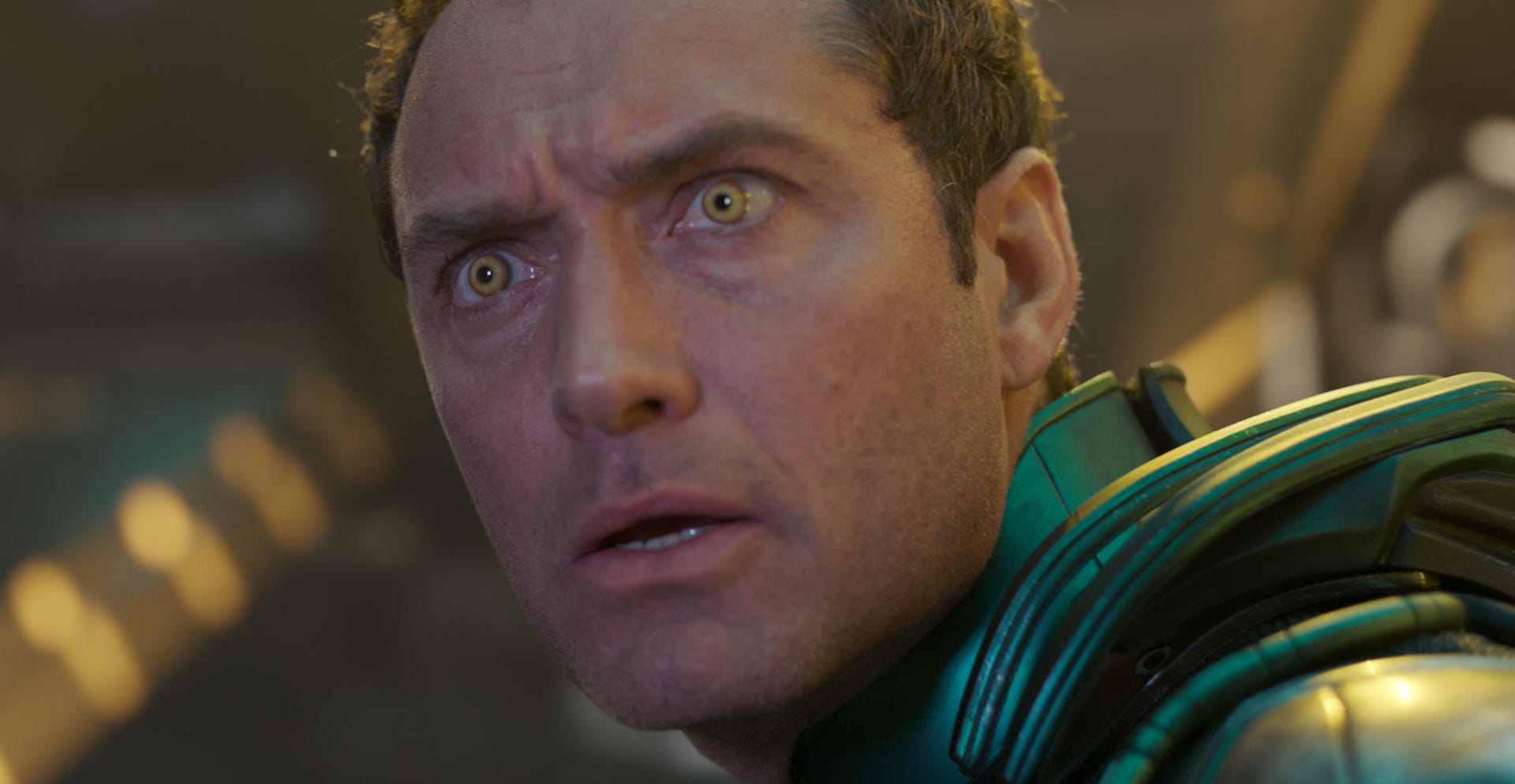 Jude Law as a space soldier stares in horror.