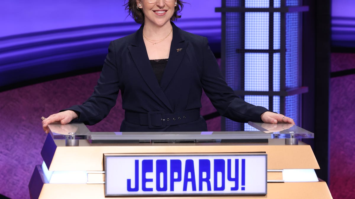 Mayim Bialik at the Jeopardy host desk