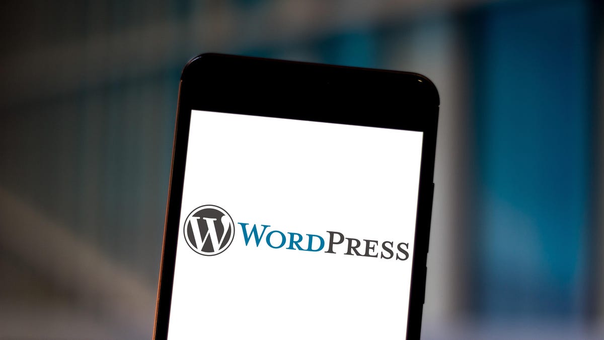 WordPress logo on a phone