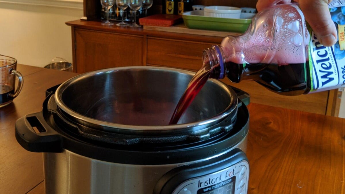Grape juice being poured into an Instant Pot