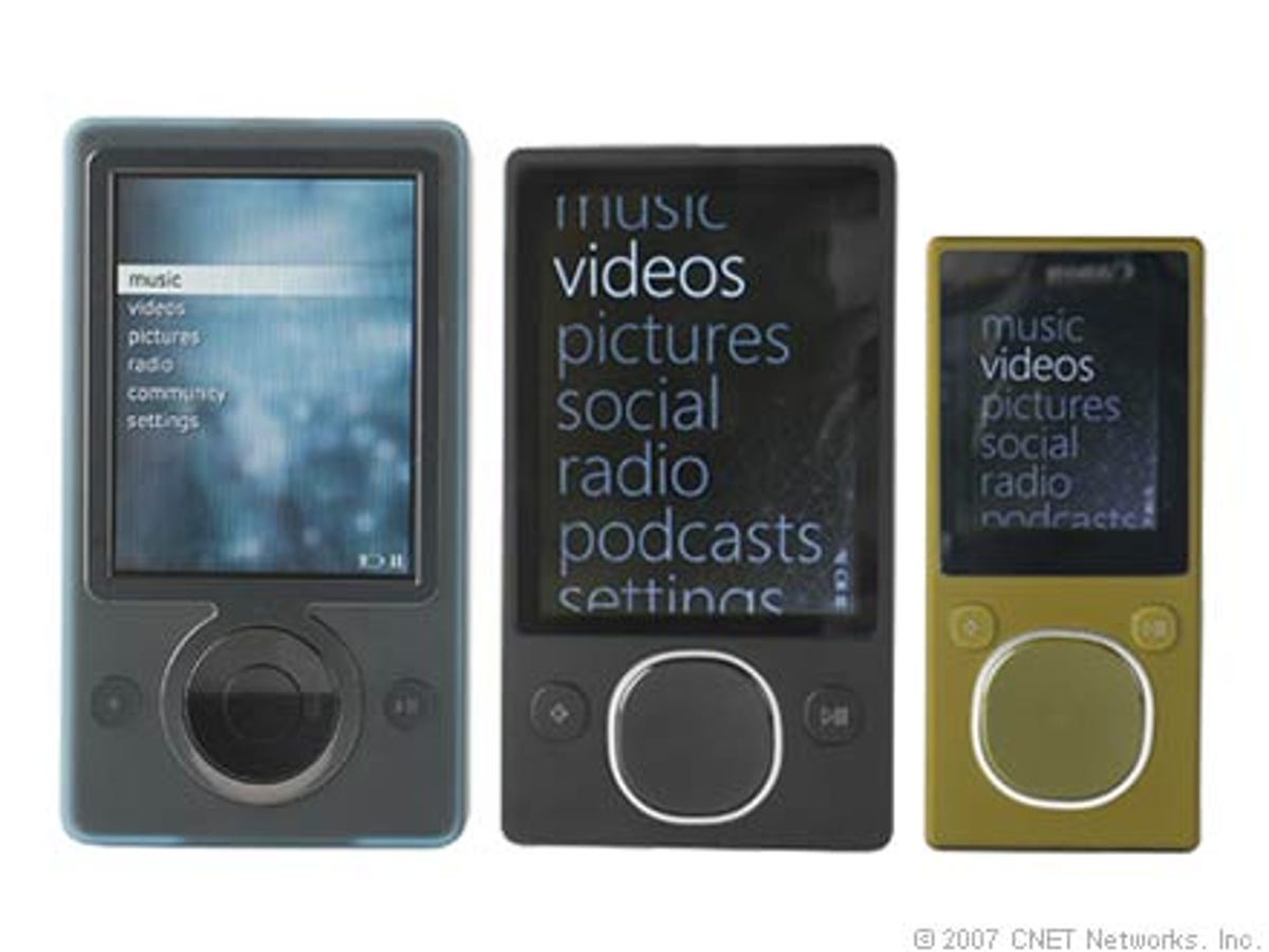 Photo of the 30GB Zune next to the 80GB Zune and 8GB Zune.