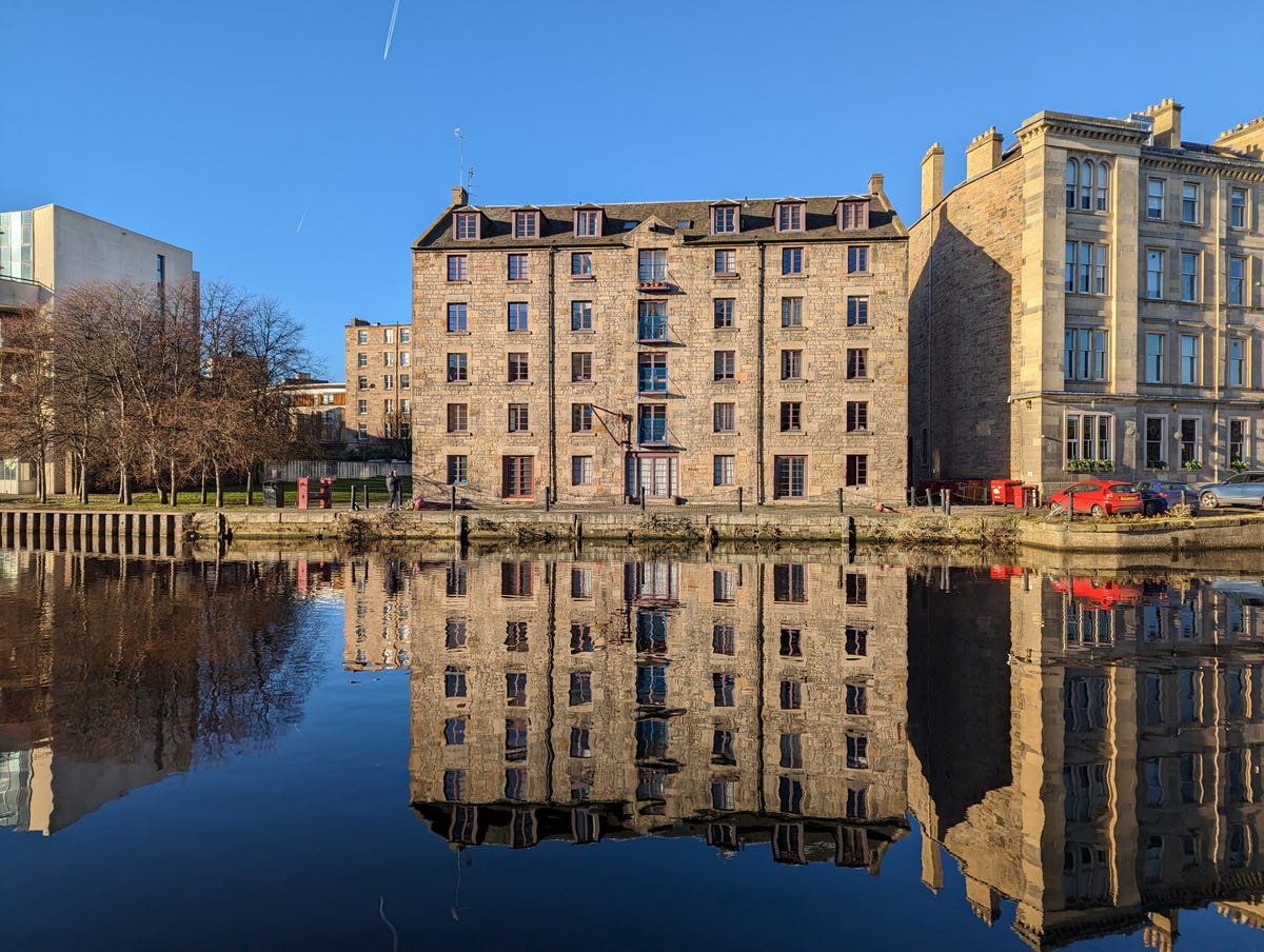 A building with its reflection in a river