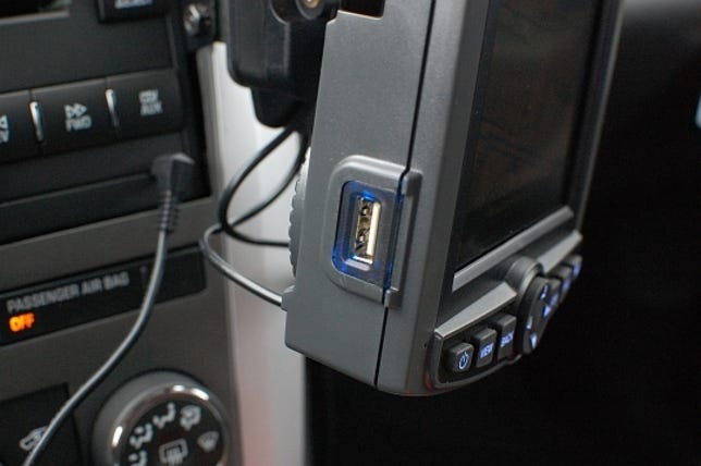 Users can upload destinations to the NeverLost using this USB connection or the unit's wireless data connection.