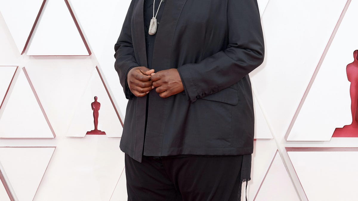 Questlove in gold Croc shoes at the 2021 Oscars