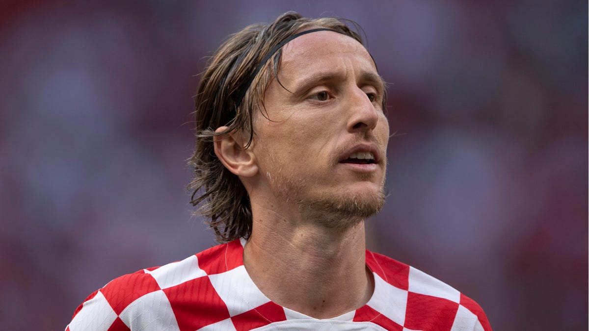 Luka Modric looking up, while playing for Croatia.
