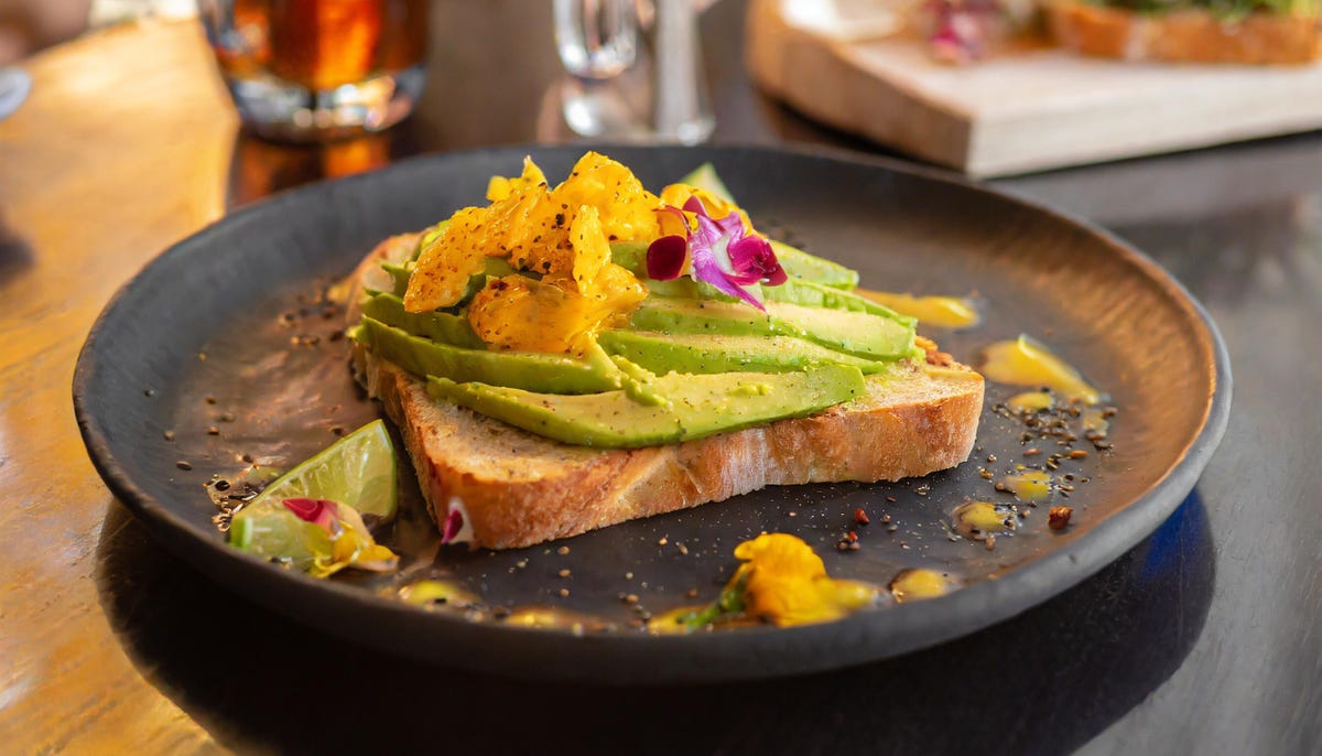 firefly-avocado-toast-on-a-plate-fresh-baked-bread-beautiful-presentation-in-a-trendy-restaurant-1.jpg