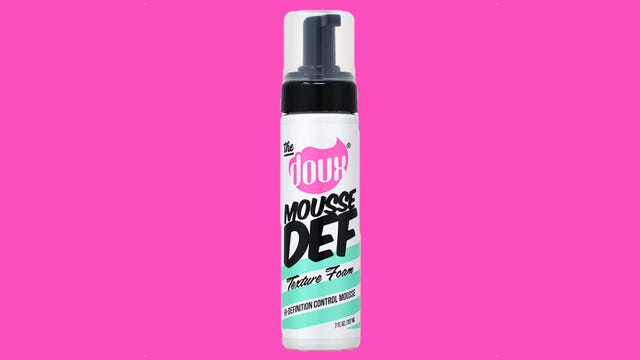 Bottle of hair mousse from The Doux brand