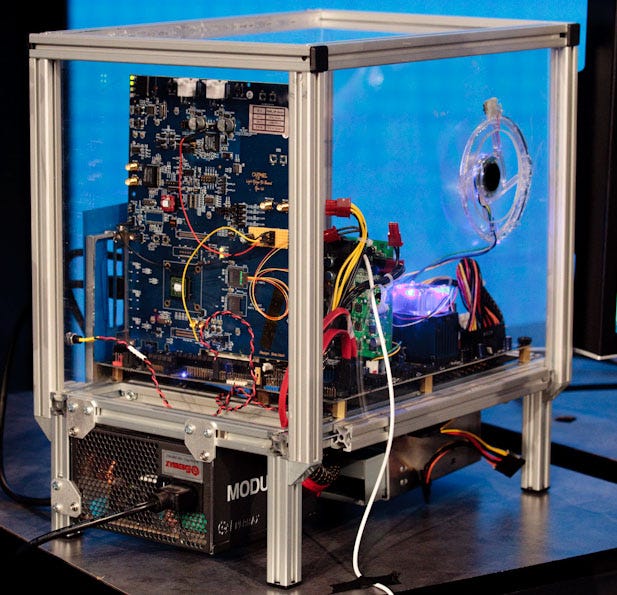 This prototype PC has the Light Peak controller and optical connector that sends signals down a single white optical cable.
