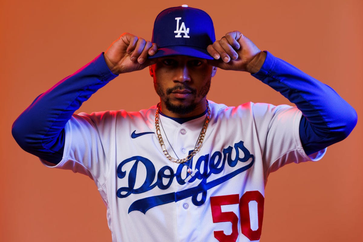 Mookie Betts adjusts his Dodgers cap