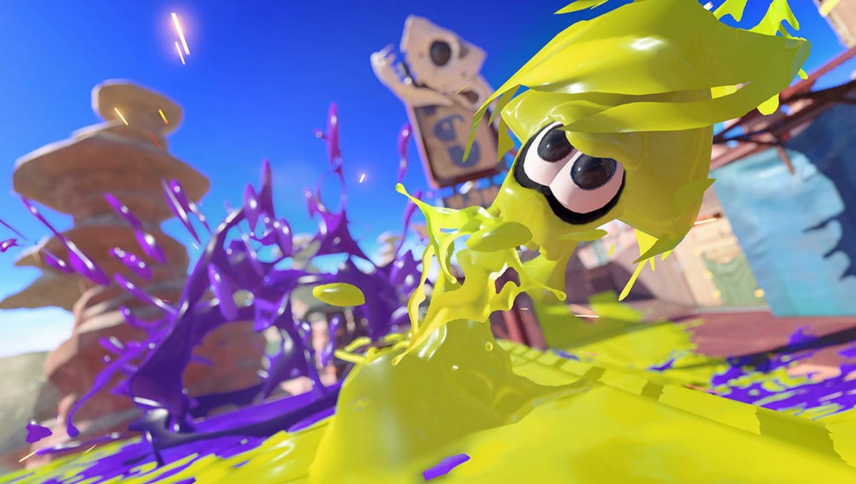 A yellow Inking does a squid roll in Splatoon 3