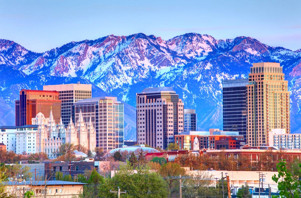 Salt Lake City skyline image with snowy mountains in the background.