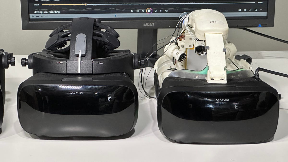 Two VR headsets side by side on a table
