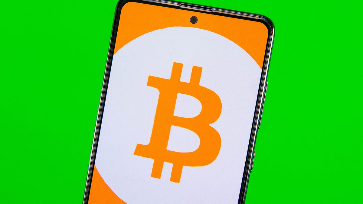 Bitcoin logo on a phone screen