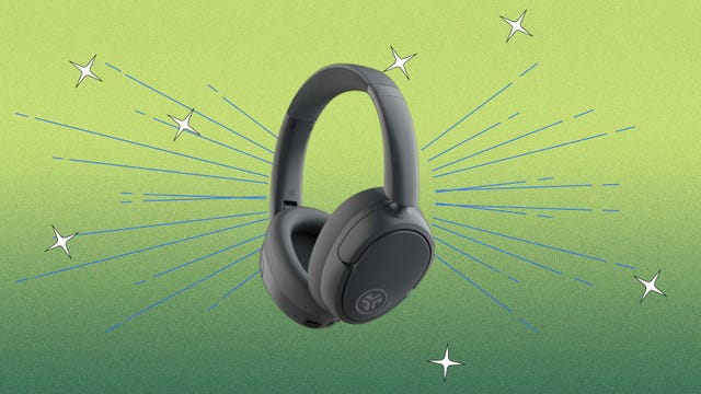 JLab Lux Anc over-ear headphones shown on a green background with lines and stars
