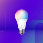 The Kasa A19 LED smart bulb is displayed against a gradient purple background.