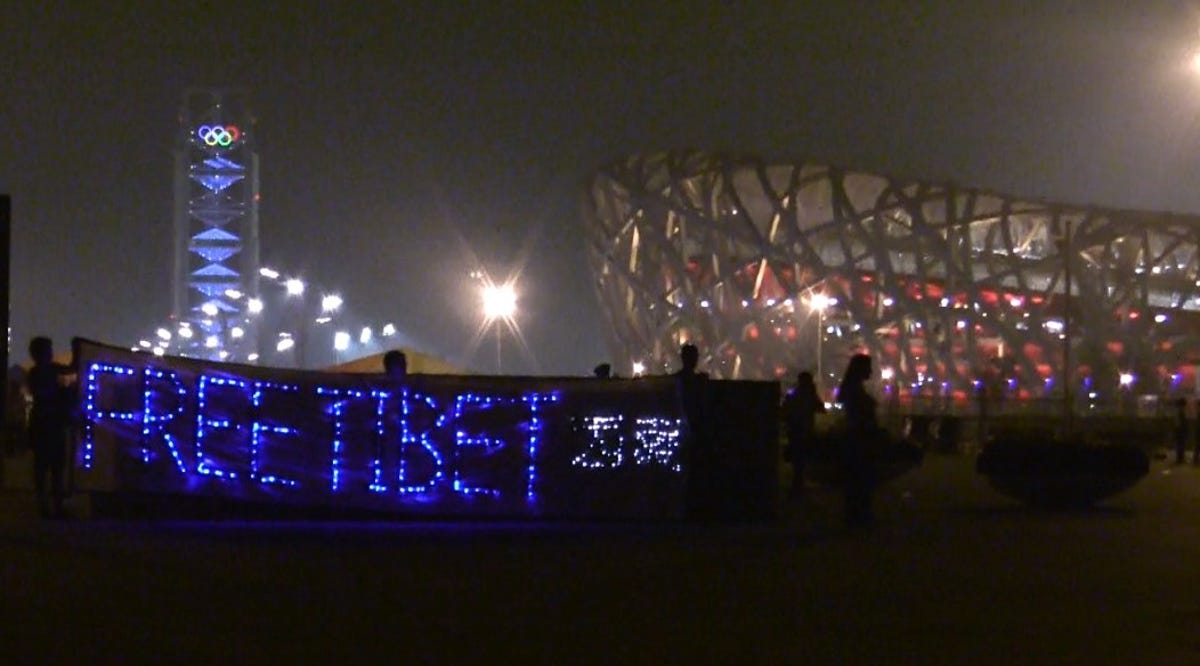 Some protestors were deported from China after successfully launching this street protest using a message made of LED 